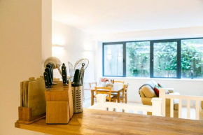Modern and bright two story apartment - Super central location.